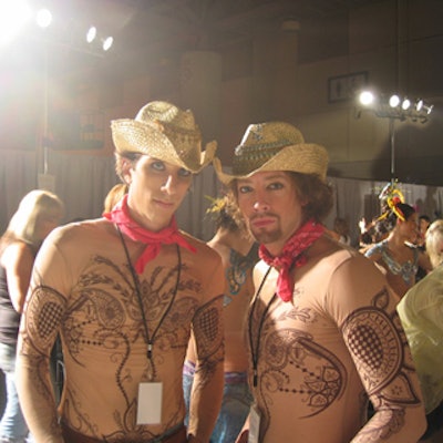 M.A.C.'s henna-tattooed cowboys posed backstage before the show.