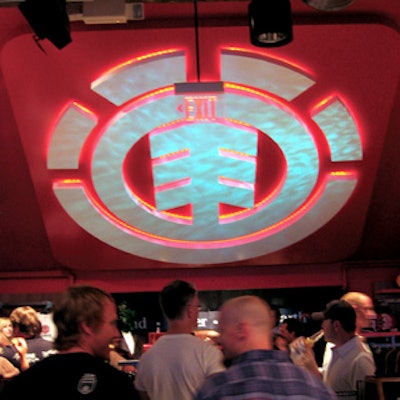 In the store, Robert Stark Lighting projected shimmering blue patterns onto a large illuminated Element logo, which had guests staring at the ceiling.