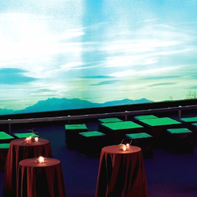 Green cube seats and burgundy-cloth covered cocktail tables filled the Hall of Ocean Life for the after-party.