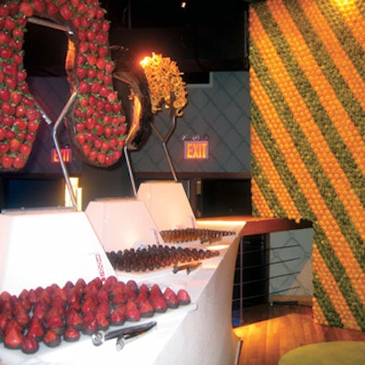 Larry Abel/De-signs decorated Garnier's lounge at Entertainment Weekly's Must List party with heads made of chocolate, with haircolors and styles represented by orange peels, strawberries, black licorice, lemon slices, and coffee beans. Avi Adler's David Stark created a large striped wall of lemons and limes filled in with yellow and green flowers as a background.