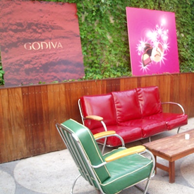 Godiva’s colorful fall packaging inspired the seating, and signage showed off the new chocolates.