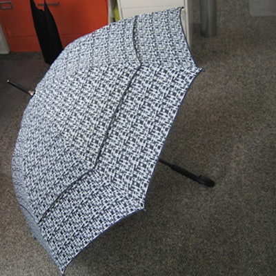In lieu of gift bags, Paula Scher of Pentagram designed umbrellas printed with a repeating pattern of the organization’s logo.