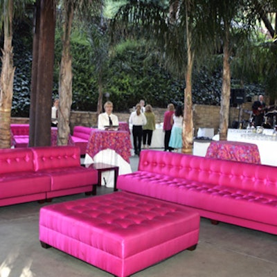 For the evening's reception, the Los Angeles Philharmonic special events department created Vegas-style lounges with fuschia satin ottomans and couches surrounded by palm trees.
