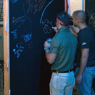 Guests were invited to express their thoughts with colored markers on blackboards.
