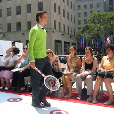 One model carried an old-fashioned tennis racket dotted with the Target logo.