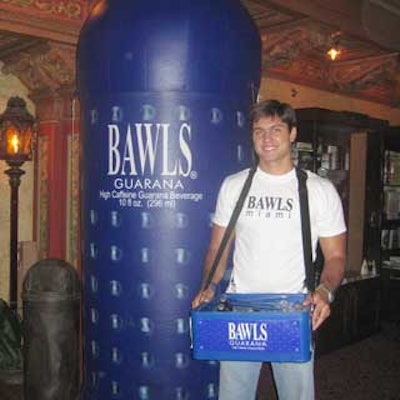 Gen Art's Styles Miami included lots of branding: BAWLS Guarana set up an inflatable bottle and had hunky servers distributing the beverage.