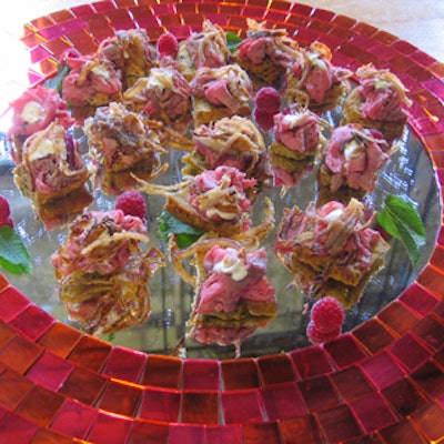 Urban Event Catering served appetizers on Ikea-brand red mosaic mirrors.