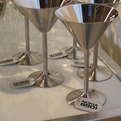 Cocktails were served in silver martini glasses hung with dog tags with the Nokia 8801 logo at a launch party at Pari Nadimi Gallery.