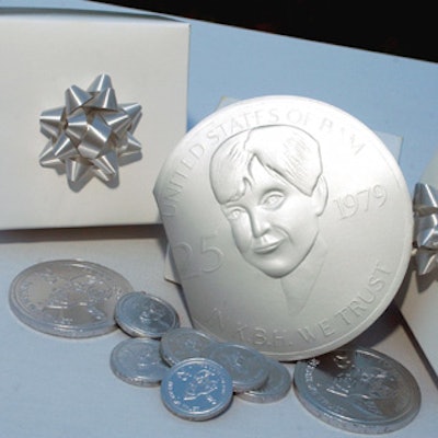 The evening’s souvenirs included chocolate coins from Choconet wrapped in silver foil with pictures of BAM's main building and Hopkins, with the words, 'United States of BAM, 25, 1979, in K.B.H. we trust.' (The same design was on the invitations.)