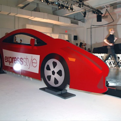 The vibrant red cutout racecar featured the Express Style logo.