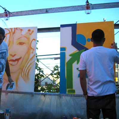 Graffiti artists from Skam created cool works of art as guests watched.
