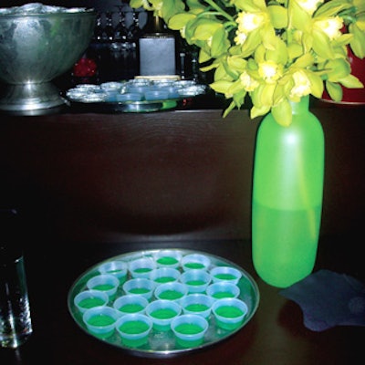 Green Jell-O shots matched flowers at the bar and sponsor Garnier’s packaging.