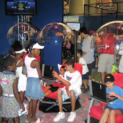 Guests at AOL's SmashZone center at the U.S. Open could browse the newly redesigned AOL.com Web site from laptop stations.