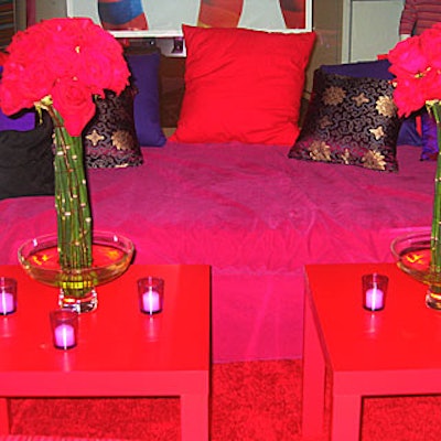 Daily Blossom decorated the after-party space on the third floor with red carpet, tables, and benches. Red roses supported by bamboo stems rose out of glass bowls.