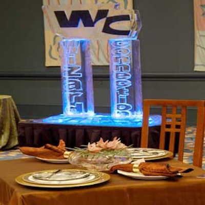 Wizard Connection's ice sculpture and Lowe and Behold Event Accents' floral arrangements were displayed on Panache's linen-clad tables in the networking area.
