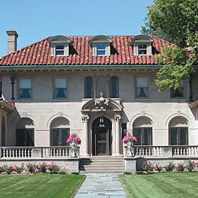 The Motown Mansion has a wood-paneled library and living room, solarium, marble dining room and ballroom, and nine bedrooms.