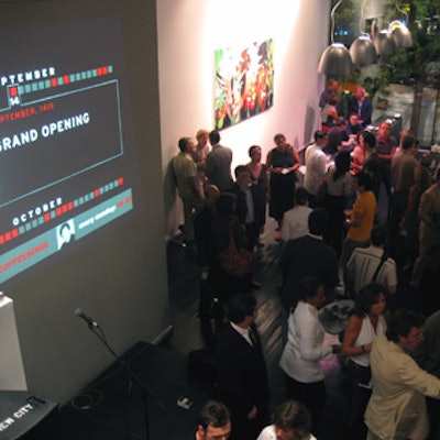 Stark white walls displayed projected images and graphics at the opening event. An Illy-commissioned James Rosenquist painting hangs on the north wall.