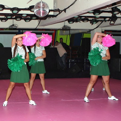 At Lacoste’s preppy after-party, Fordham University’s cheerleading squad performed for guests on a dance floor built over bowling lanes.