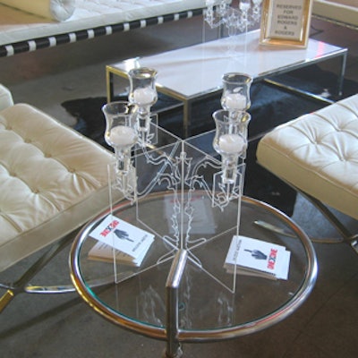 A faux mini candelabra with candles from Signature Rentals added luster to the lounge decor in the silent-auction room.
