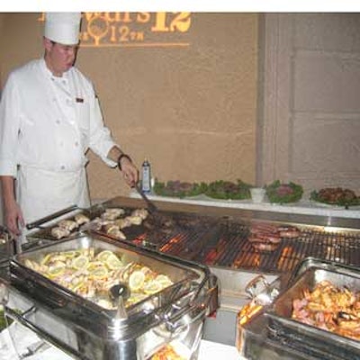 One of the Biltmore Hotel's chefs grilled meat for guests to savor.
