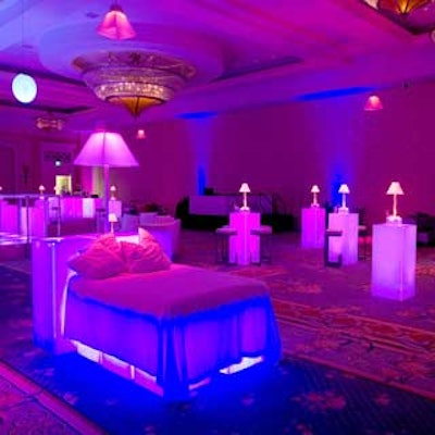 The after-party featured glowing beds for lounging, bars, lamps, tables, and a dance floor that changed colors.