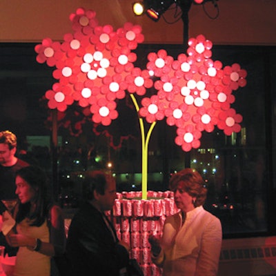 Flower-shaped sculptures with Jif peanut butter and Nutella jar caps topped the bars.