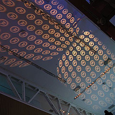 Levy Lighting created a disco-ball-frozen-in-time effect with hundreds of Motorola gobos projected across the ceiling.