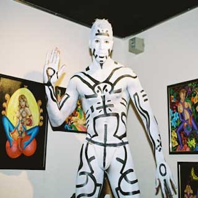 A model dressed as a Keith Haring painting performed at the opening press party for the World Erotic Art Museum in Miami Beach.