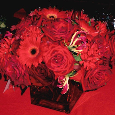 DeJuan Stroud decorated tables with simple, monochromatic floral centerpieces.