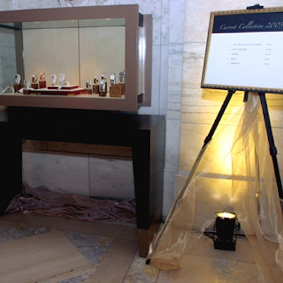 Museumlike display cases showed off watches and watchmaking tools.