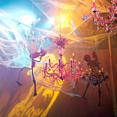Crystal chandeliers and plastic skeletons entangled in synthetic spiderwebs hung above the dance floor at the Central Park Conservancy’s annual Halloween ball.