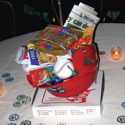 At the opening night party for Neil Simon's The Odd Couple, Nathan Lane's sportswriter character Oscar inspired the centerpieces in the form of baseball helmets, pizza boxes, sports pages, a baseball, and snacks like pretzels, potato chips, and candy bars.