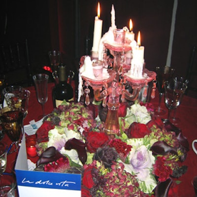 The dining room featured bordellolike, slightly gothic decor, with dripping candelabra on the tabletops.