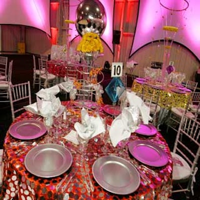 Mirrored Indian fabrics and dramatic centerpieces by Harbour Bay Florist decorated the tables.