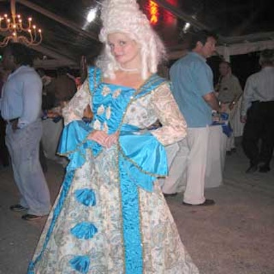 A model dressed as Marie Antoinette roamed the French-themed opening party for L'Opera brasserie in West Palm Beach.