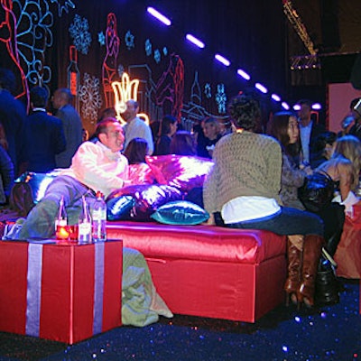 At the after-party, the walls were lined in black velvet painted with sponsor Imperia's logos and sketches of sexy women, glowing in shades of neon under black lights.
