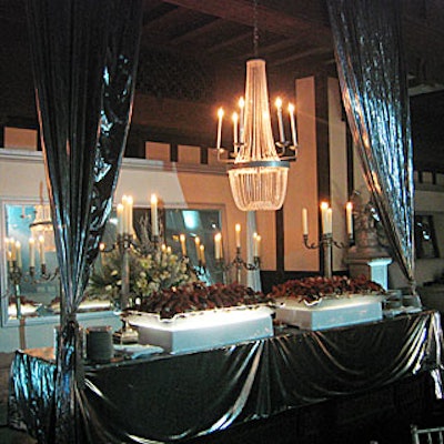 Wendy Creed Productions created a sparkling winter scene that included decorative makeovers of the hall’s side nooks, which featured custom-made mirrors, shiny silver drapery, and chandeliers.