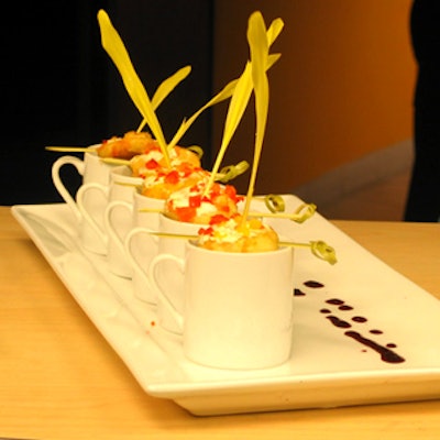 Miniature shrimps topped with smoked salmon were served in espresso cups before the sit-down dinner.