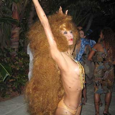 A barefoot goddess from Parafernalia Productions amplified the decadent feel of the party.