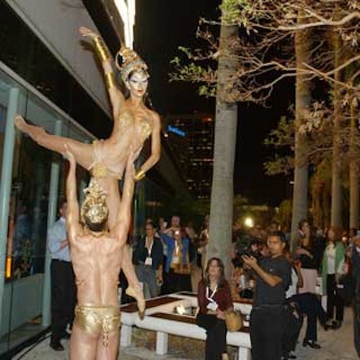 Performers from Parafernalia Productions made a dramatic entrance during the Asian-themed reception.