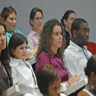 Attendees listened as keynote speaker Simon Bailey led a motivational seminar.