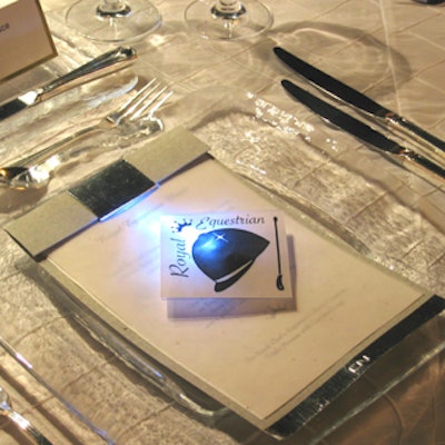 Neon light novelties from Chair-man Mills illuminated the menu at each place setting.