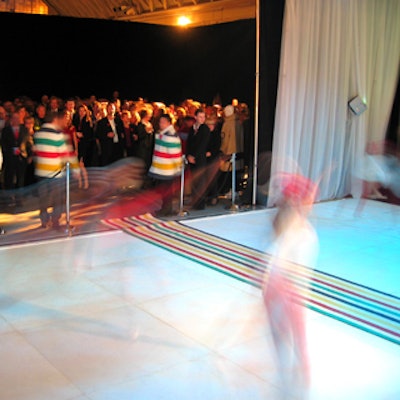 Young figure skaters twirled energetically on an artificial ice rink at Fort York Armoury during Hudson?s Bay Company?s unveiling of its new uniforms for Canada?s Olympic athletes.