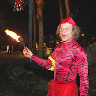 A festively costumed fire-eater was one of the entertainers for the evening.