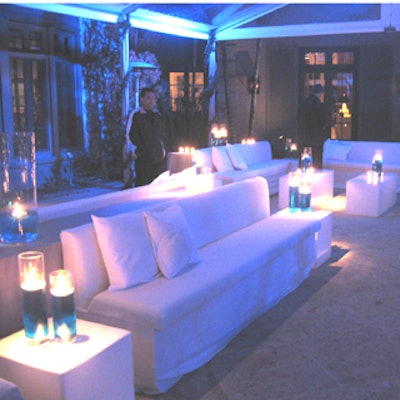 A separate lounge area maintained the cool winter theme with white sofas and candles floating in blue-colored water.