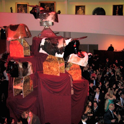 The centerpiece in the rotunda of the Guggenheim Museum's annual Young Collectors Council Artist's ball: a 20-foot tower covered in red cloth and adorned with six rocking, tilting mechanical bulls.