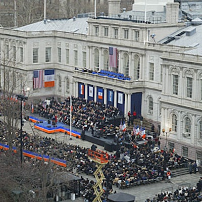 The inauguration ceremony of Mayor Michael Bloomberg filled the outdoor plaza in front of City Hall and extended into the park. Orange, blue, and white—the colors of the New York City flag—decorated the stage.