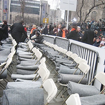 Ceremony guests—all 5,000 of them—sat on Party Time/Academy Chair Rental's white folding chairs each set with thick gray army blankets to warm against the mid-winter chill.