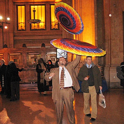 Two-hundred Hover Discs—Mylar balloons with rigid frames that allow them to stay aloft—floated throughout the space, where guests batted them around when they gently landed on the guests' heads.