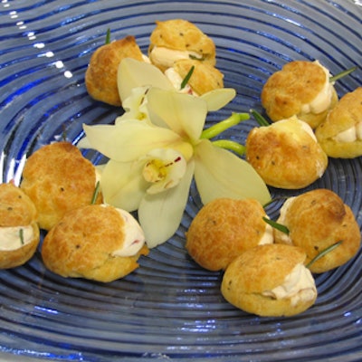 Eatertainment Special Events & Catering served profiteroles filled with goat cheese and roasted red peppers.
